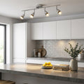 Saxby Amalfi chrome 4-light ceiling spotlight bar illuminating a modern white and grey kitchen interior.