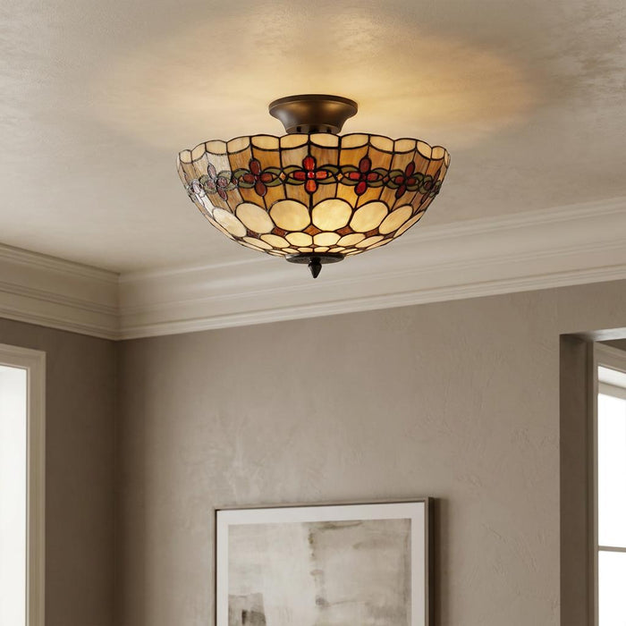 Atlantic Semi Flush Tiffany Ceiling Light with a stained glass floral shade mounted on a neutral ceiling.
