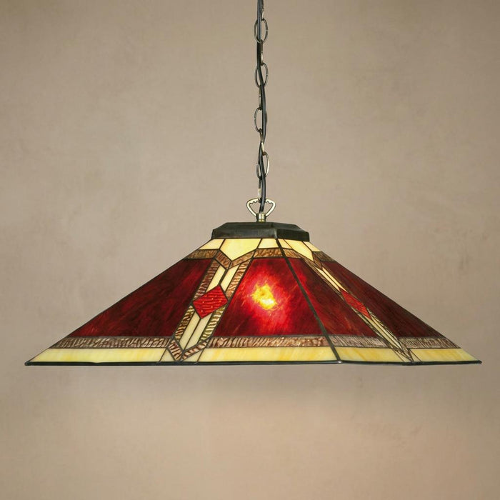 Aztec Tiffany ceiling light with a red and cream stained glass pyramid shade suspended by a chain.