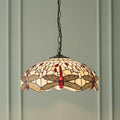 Beige dragonfly Tiffany ceiling pendant with red accents hangs from a chain against a light green paneled wall.