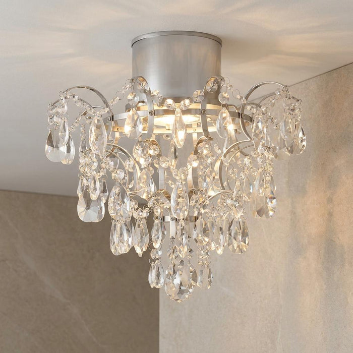 Elegant Belle Chrome semi-flush bathroom chandelier featuring cascading teardrop crystal droplets on a silver mount.