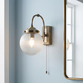 Belvue 1 Light Brass Bathroom Wall Light, Clear Globe Shade by Searchlight Lighting — suits living rooms, bedrooms & hallways