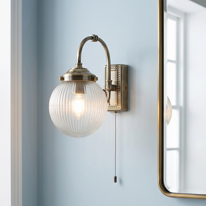 Belvue 1 Light Brass Bathroom Wall Light, Clear Globe Shade by Searchlight Lighting — suits living rooms, bedrooms & hallways