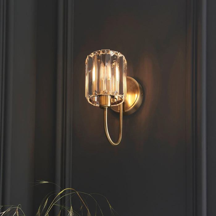 berenice brass wall light clear cut glass shade by Endon Lighting Bedroom Hero Shot