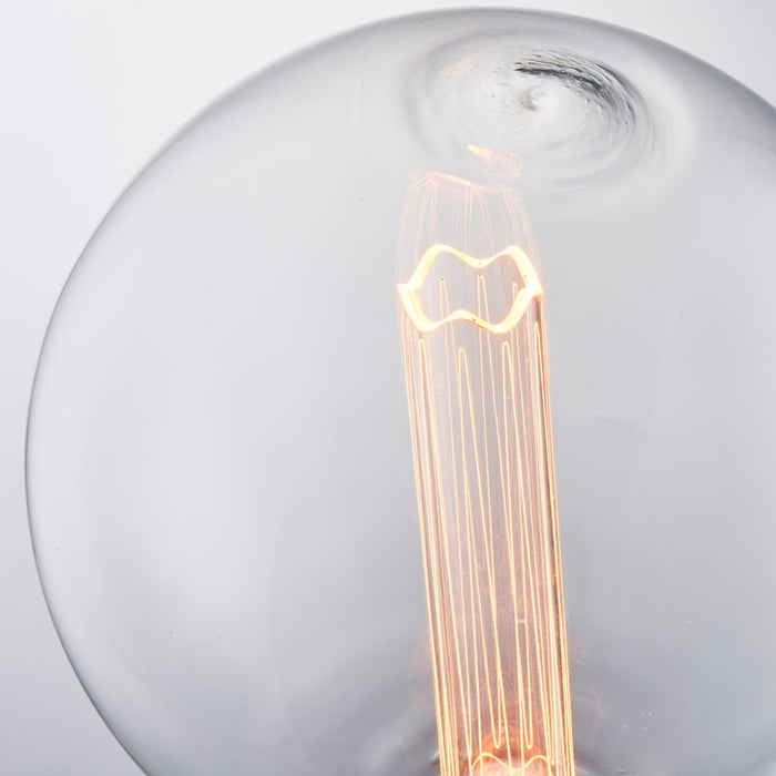 e27 globe internal cylinder clear led 2 8w light bulb 200mm Living room close up image