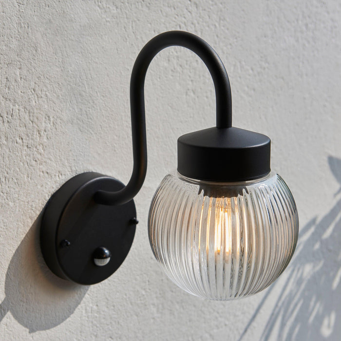 eldon pir black outdoor wall light by Endon Lighting Living Room Family Shot