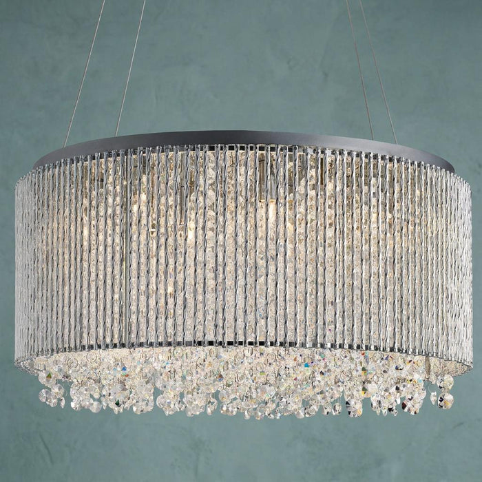 Drum-shaped chrome pendant light featuring vertical crystal bars and a cascading crystal fringe at the base.