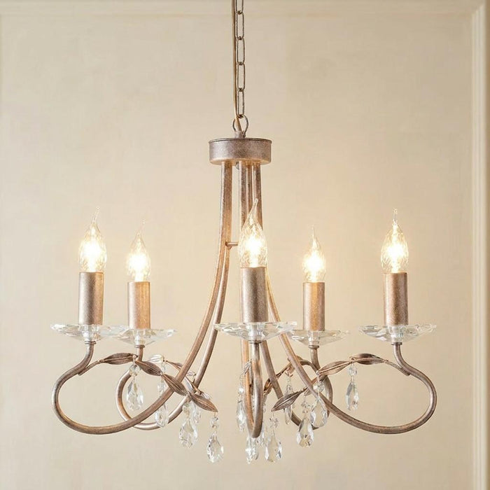 Elstead Christina 5-light chandelier in silver and gold leaf finish with crystal droplets and leaf accents.