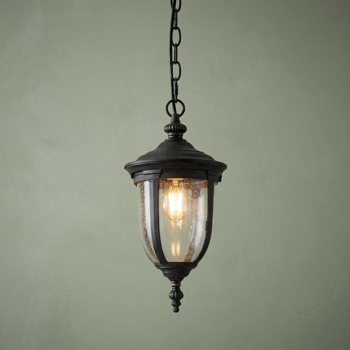 Elstead Cleveland 1 light bronze outdoor small chain lantern with seeded glass shade and hanging chain.