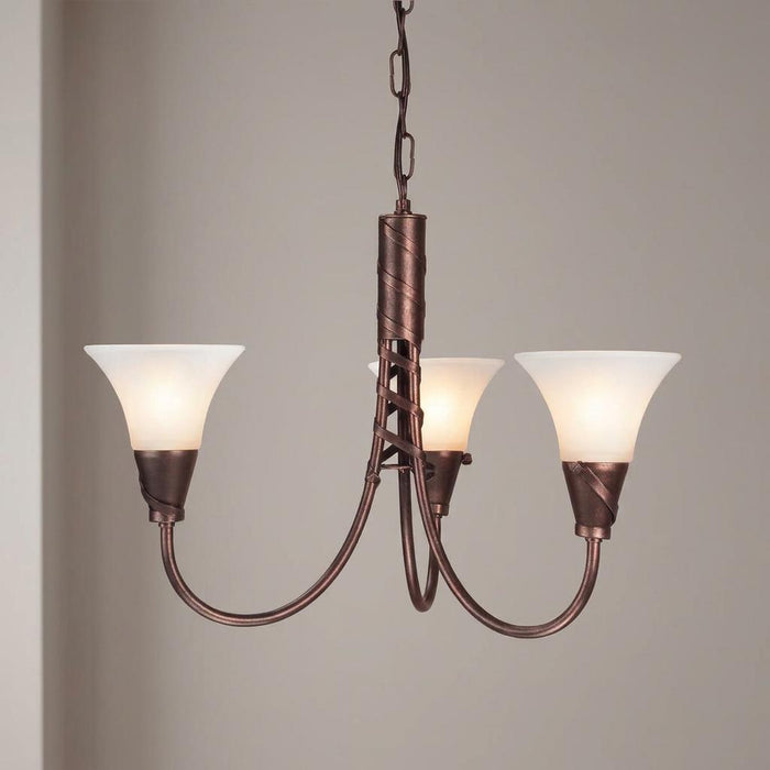Three-light copper chandelier with frosted trumpet shades and twisted metal detailing against a neutral wall.