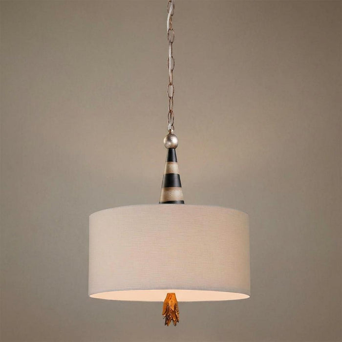 Pendant ceiling light with a cream fabric drum shade, a black and silver striped cone top, and a gold leaf finial.