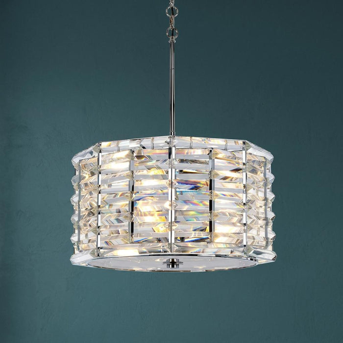 A luxurious Elstead Shoal 4 light polished nickel pendant featuring clear crystal prisms on a teal background.