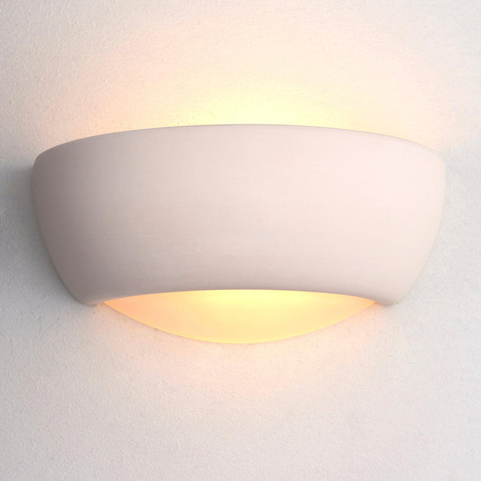eton unglazed ceramic wall light by Endon Lighting Living room close up image