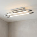 Modern chrome flush ceiling light with two horizontal glowing LED tubes.