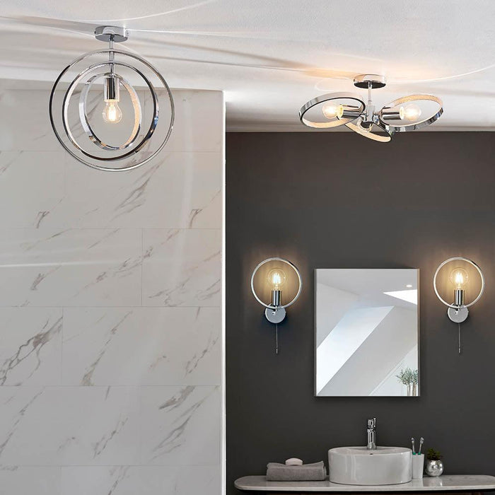 merola chrome finish bathroom wall light 1 by Endon Lighting Bedroom Close Up Image