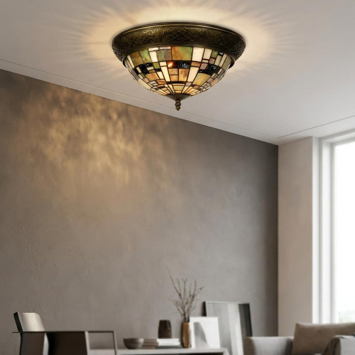 Falling Water Tiffany flush ceiling light with geometric stained glass panels mounted on a white ceiling.