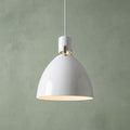 Glossy white dome pendant light with polished nickel hardware against a textured sage green wall.