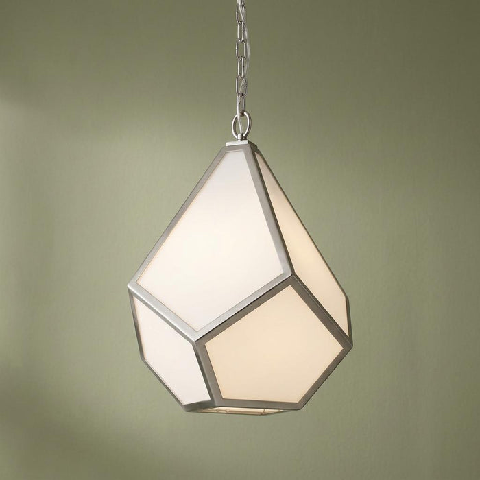 A geometric diamond-shaped pendant light with frosted glass panels and a nickel frame hangs from a chain.