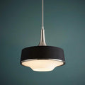 Modern 4-light pendant with a black fabric shade and brushed nickel finish, set against a teal background.