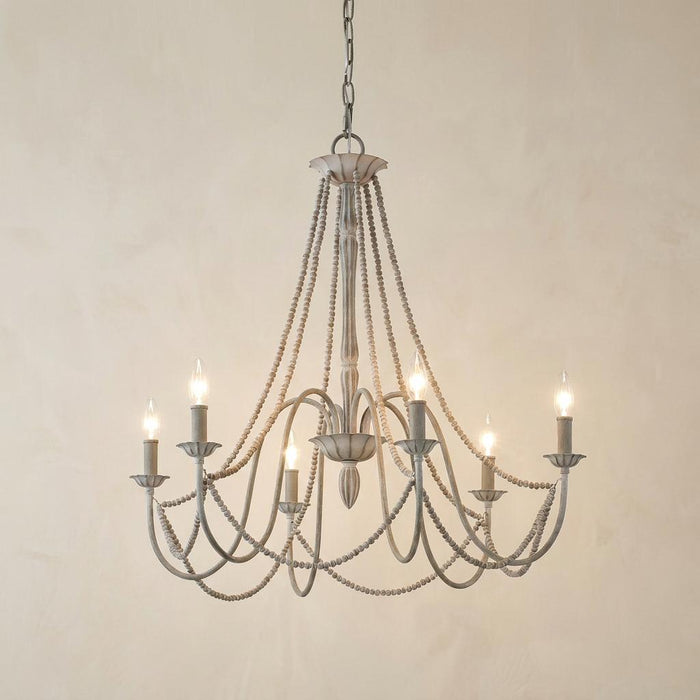 Feiss Maryville 6-light chandelier in weathered grey with elegant curved arms and draped wood beads.