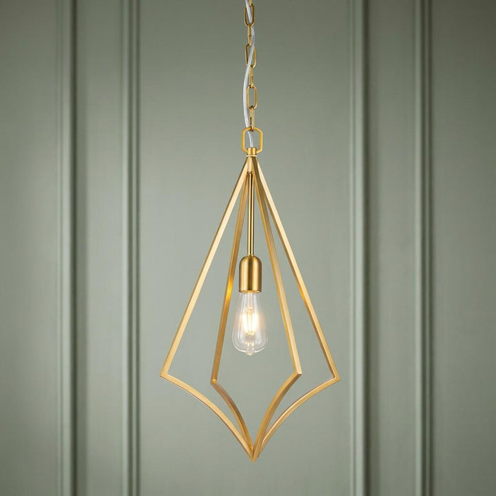 Feiss Nico 1 light brass geometric pendant with nested diamond frames against a green paneled wall.