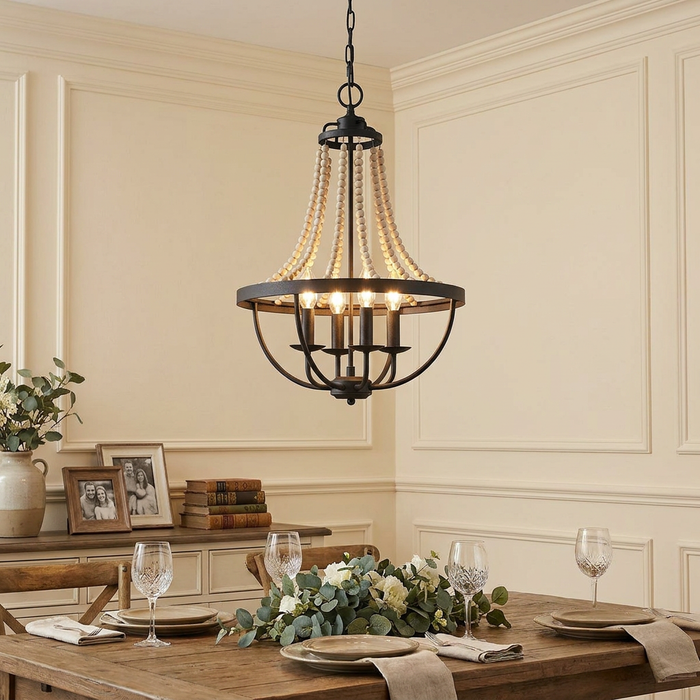 Feiss Nori 4 Light Zinc & Wood Bead Chandelier hanging over an elegantly set dining table in a neutral room.