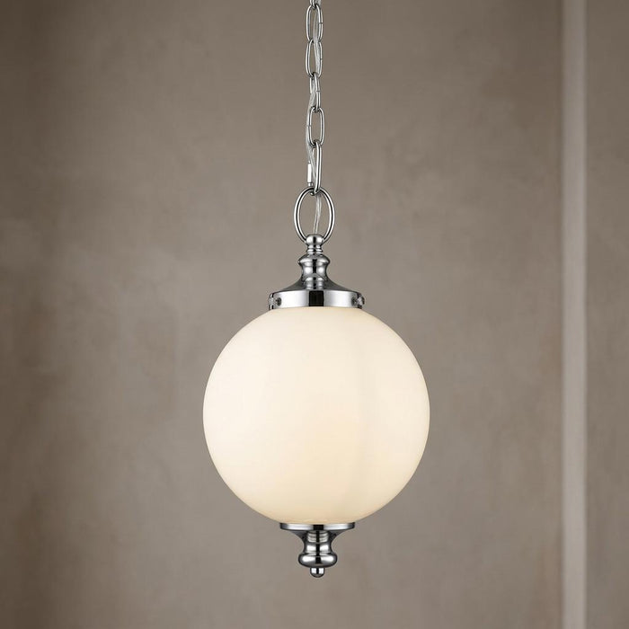 Feiss Parkman nickel small ceiling pendant light featuring a white glass globe and chain suspension.