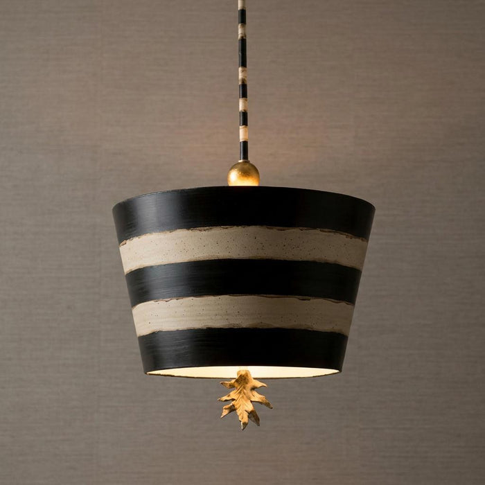 Flambeau South Beach pendant light with black and cream striped drum shade and a gold leaf finial.
