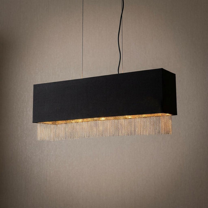 Rectangular black pendant light featuring a decorative gold chain fringe hanging from the bottom.