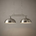 Satin silver 2-light ceiling bar with dome shades hanging from chains against a textured wall.