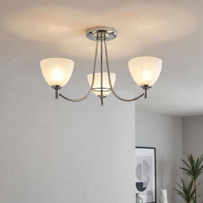 Hamburg 3 Arm Chrome Finish Art Deco Ceiling Light with frosted glass shades in a modern living room.