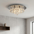 Hanna 4-light chrome flush ceiling light with cascading crystal balls illuminating a modern interior.