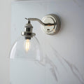 hansen nickel wall light with clear glass shade by Endon Lighting Living Room Family Shot