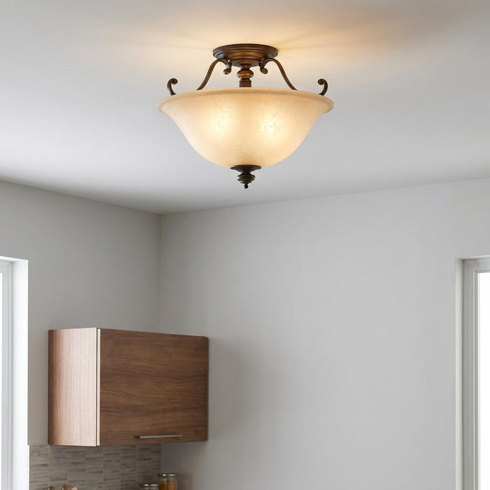Hinkley Dunhill Bronze semi-flush ceiling light with a cream glass bowl shade and scroll details in a kitchen setting.