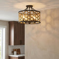 Hinkley Felix 4-light semi-flush ceiling mount with gold honeycomb shade casting patterned shadows in a kitchen.
