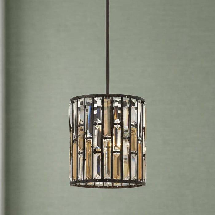 Hinkley Gemma Mini Zinc Pendant Ceiling Light with rectangular amber crystals against a light green wall.