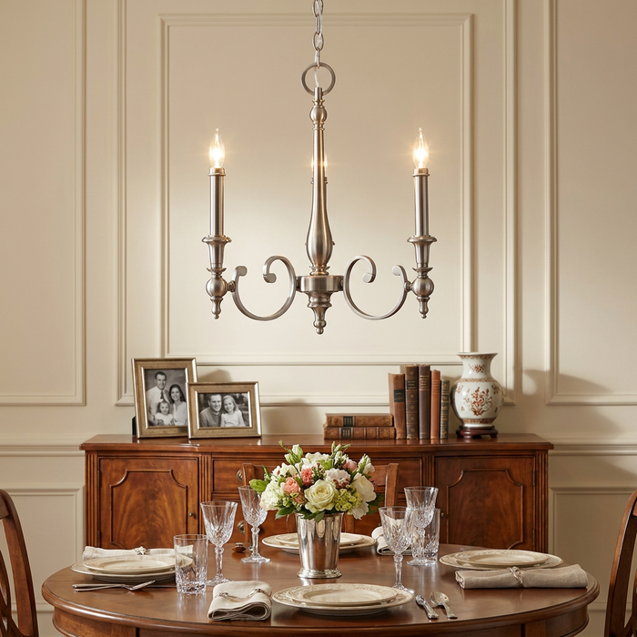 Hinkley Yorktown antique nickel 3-light chandelier hanging above a set dining table with floral centerpiece.
