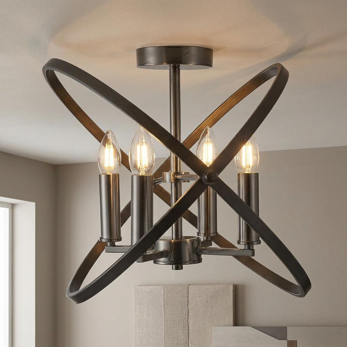 A pewter semi-flush ceiling light featuring four candle-style bulbs enclosed by intersecting orbital hoops.