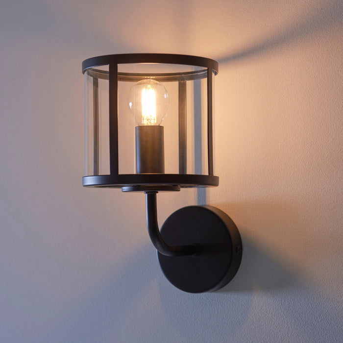 hopton black wall light clear glass shade by Endon Lighting Living room close up image