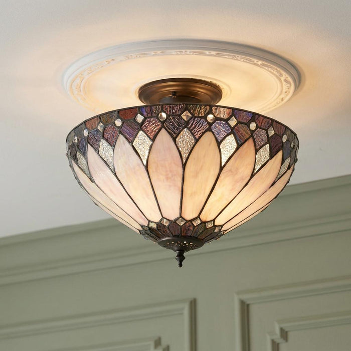 Brooklyn semi-flush Tiffany ceiling light with a purple and amber Art Deco glass shade on a decorative ceiling rose.
