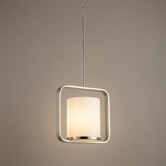 Polished nickel pendant light featuring a square metal frame and a glowing cylindrical white glass shade.