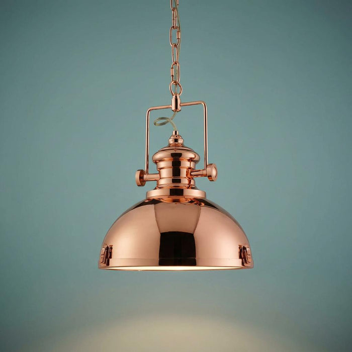 Louisiana Industrial 1 Light Copper Pendant Searchlight with a polished dome shade against a teal background.