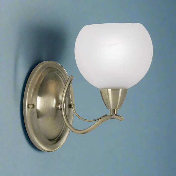 Luanda Antique Brass Living Room Wall Light blue wall