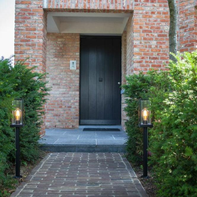 Lutec Flair Outdoor Bollard In Matt Black 7288801012 two either side of a pathway