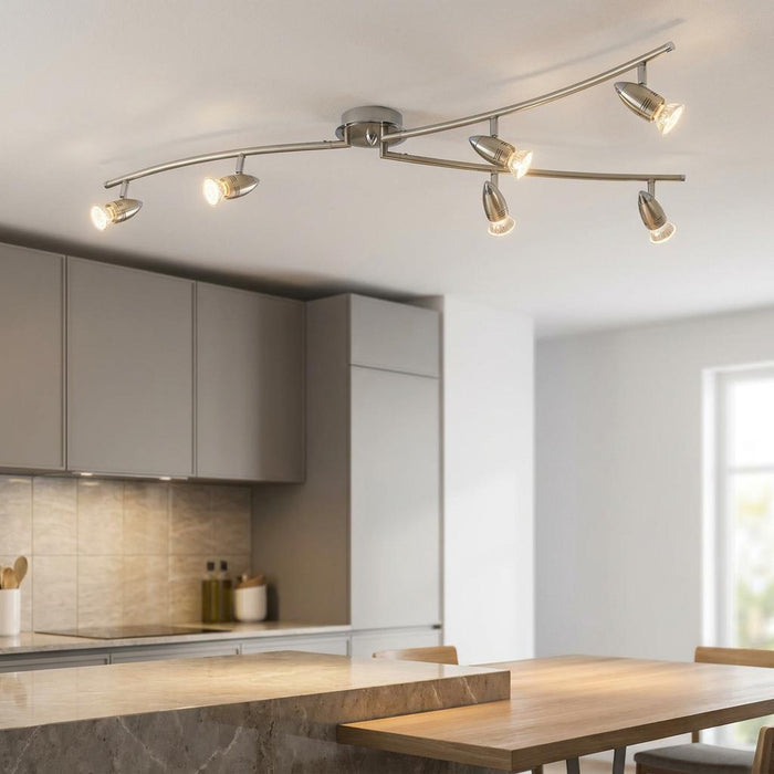 Eglo Magnum-LED nickel 6-light 3-arm spotlight ceiling fixture illuminated in a modern kitchen setting.