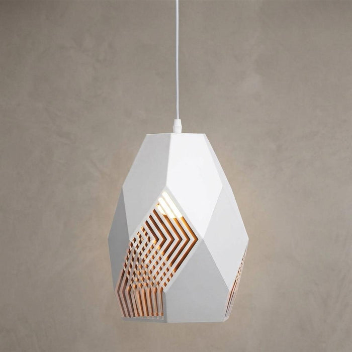 Large Melfi white laser-cut geometric pendant light with gold inner, hanging against a neutral textured wall.