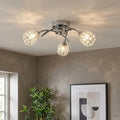 Naira 3 Light Chrome Flush Ceiling Light with crystal cage shades casting light patterns in a modern room.
