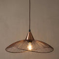 Oaks Lighting Helios copper wire pendant light with a curved, open shade against a neutral wall.