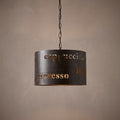 Black cylindrical pendant light with laser-cut coffee-related text like cappuccino and espresso.
