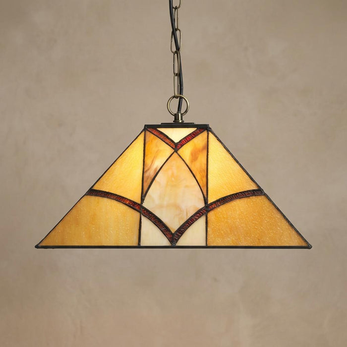 Oaks Portia Tiffany single bulb ceiling pendant with a triangular art glass shade in amber and cream tones.